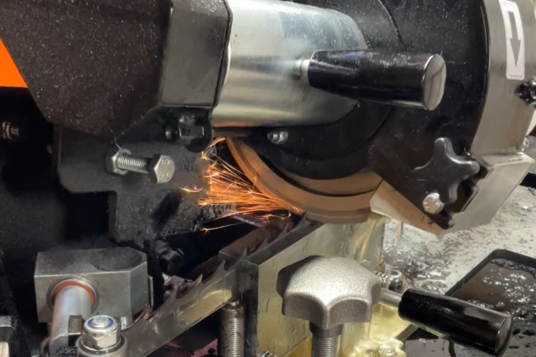 Sharpening a band sawmill blade and throwing sparks