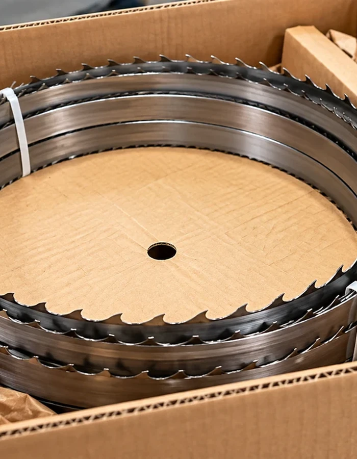 Coiled sawmill blades pack securely for shipping to be sharpened and set