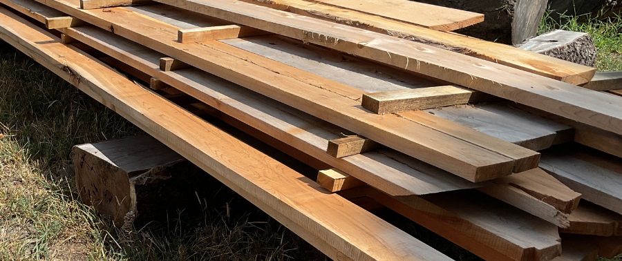 Fresh cut lumber showing the results of proper sawmill blade sharpening and setting.